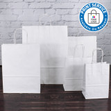 White paper carrier bags with twisted handles top